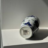 Vase white background stylized blue, yellow and green flowers H24.5 D12