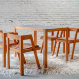 Ensemble de 4 chaises et table avec plateau en formica