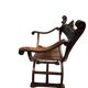 Fauteuil dit Dagobert en bois sculpté vers 1900