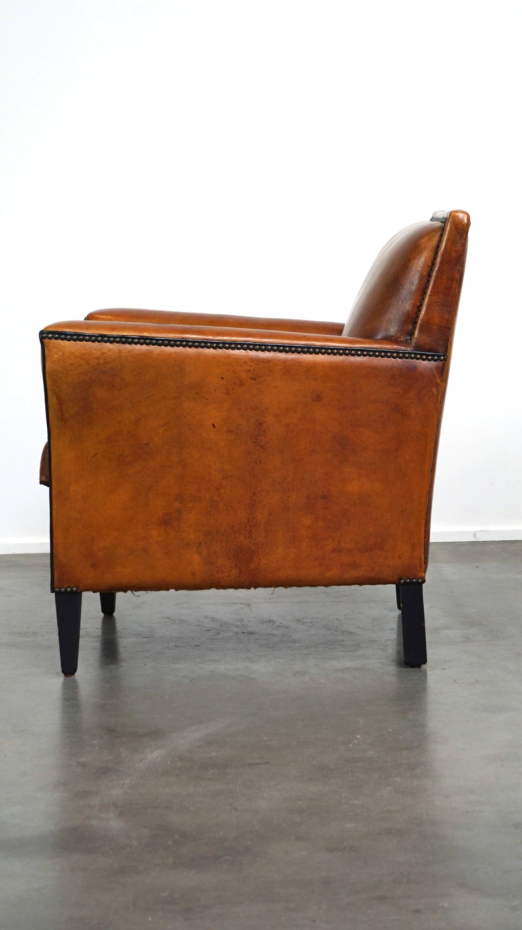 Sleek sheepskin Art Deco design armchair with beautiful details