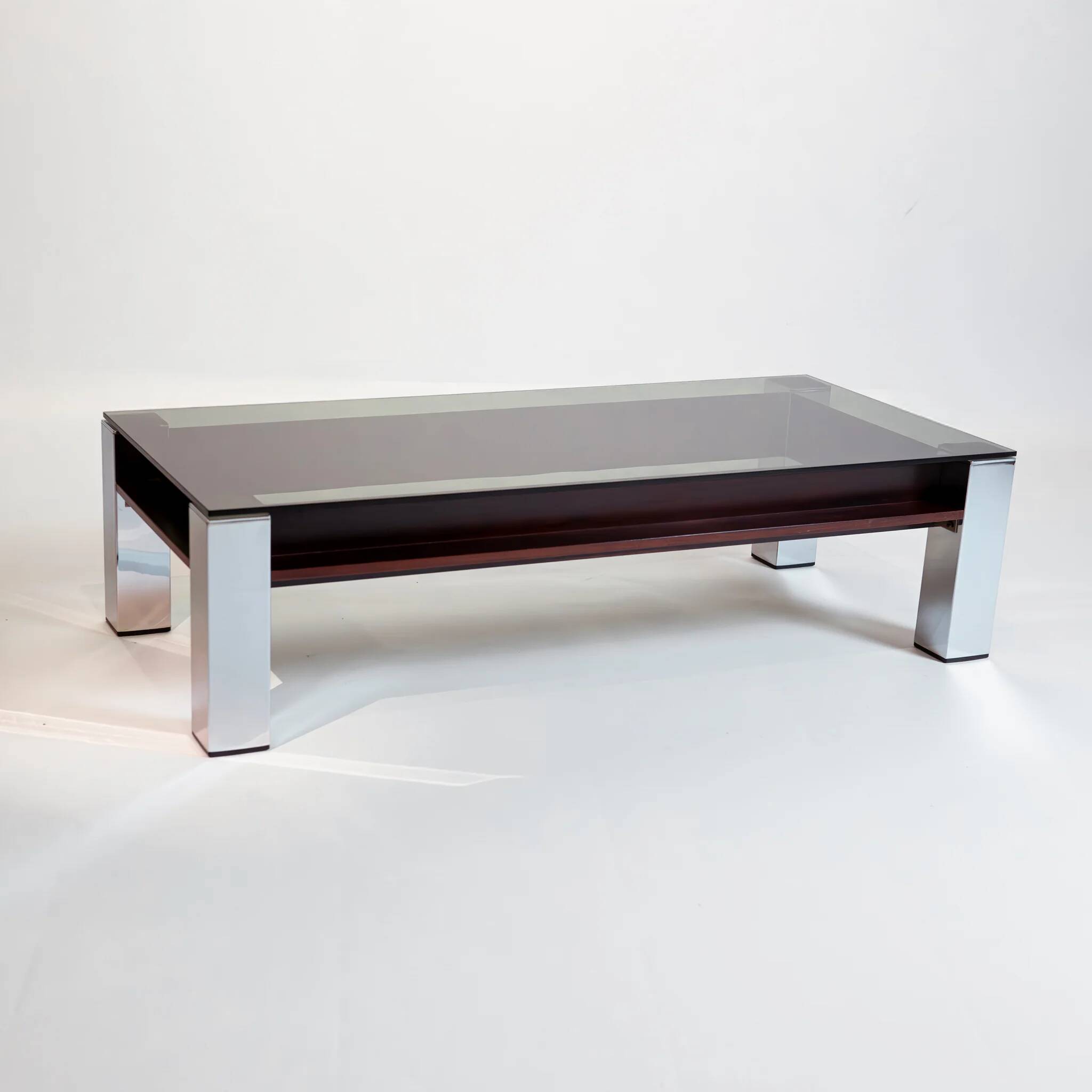 Vintage Italian coffee table with a smoked glass top and chrome structure.