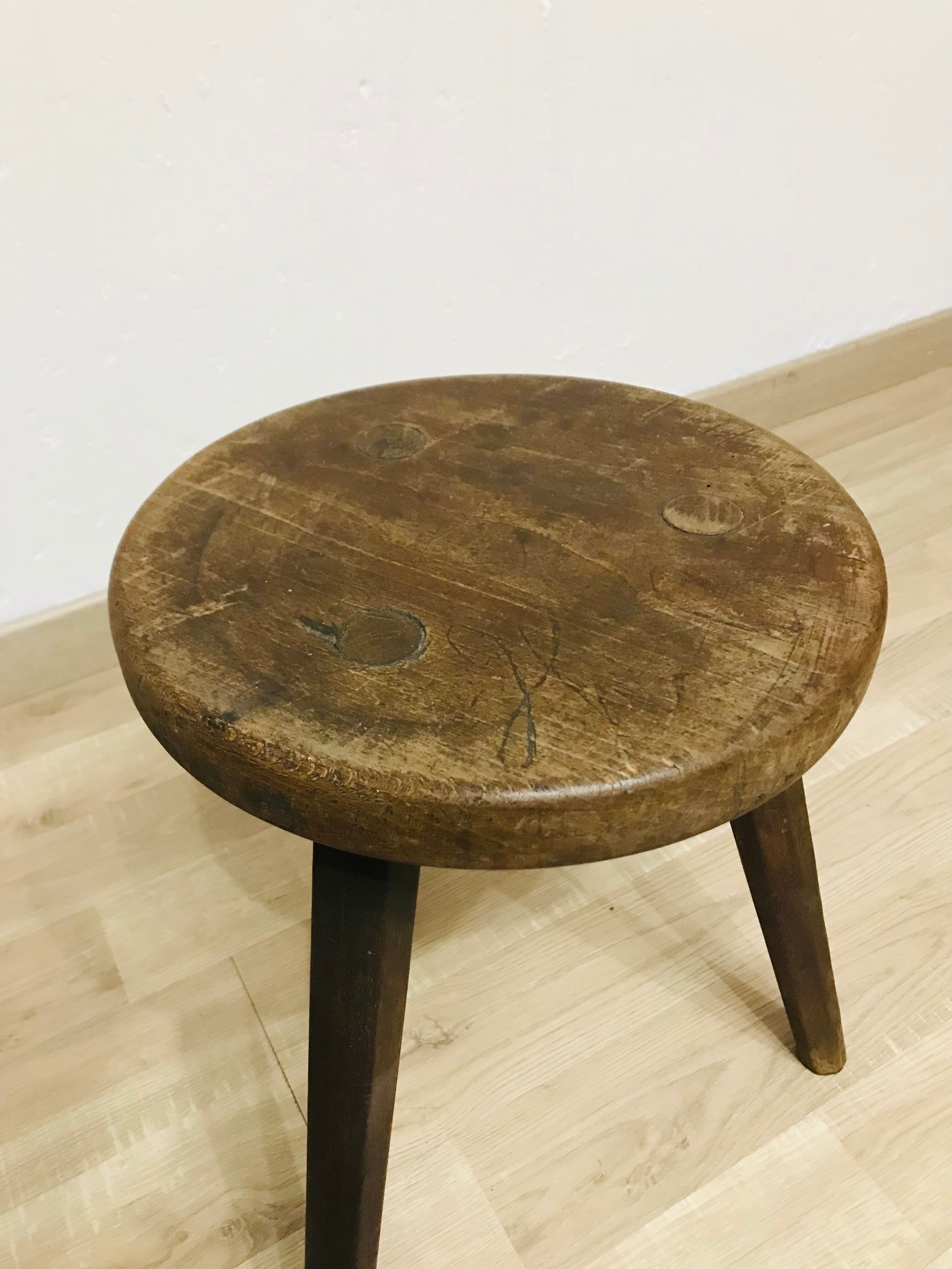 Old farm stool