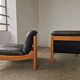 Pair of designer leather armchairs 80s