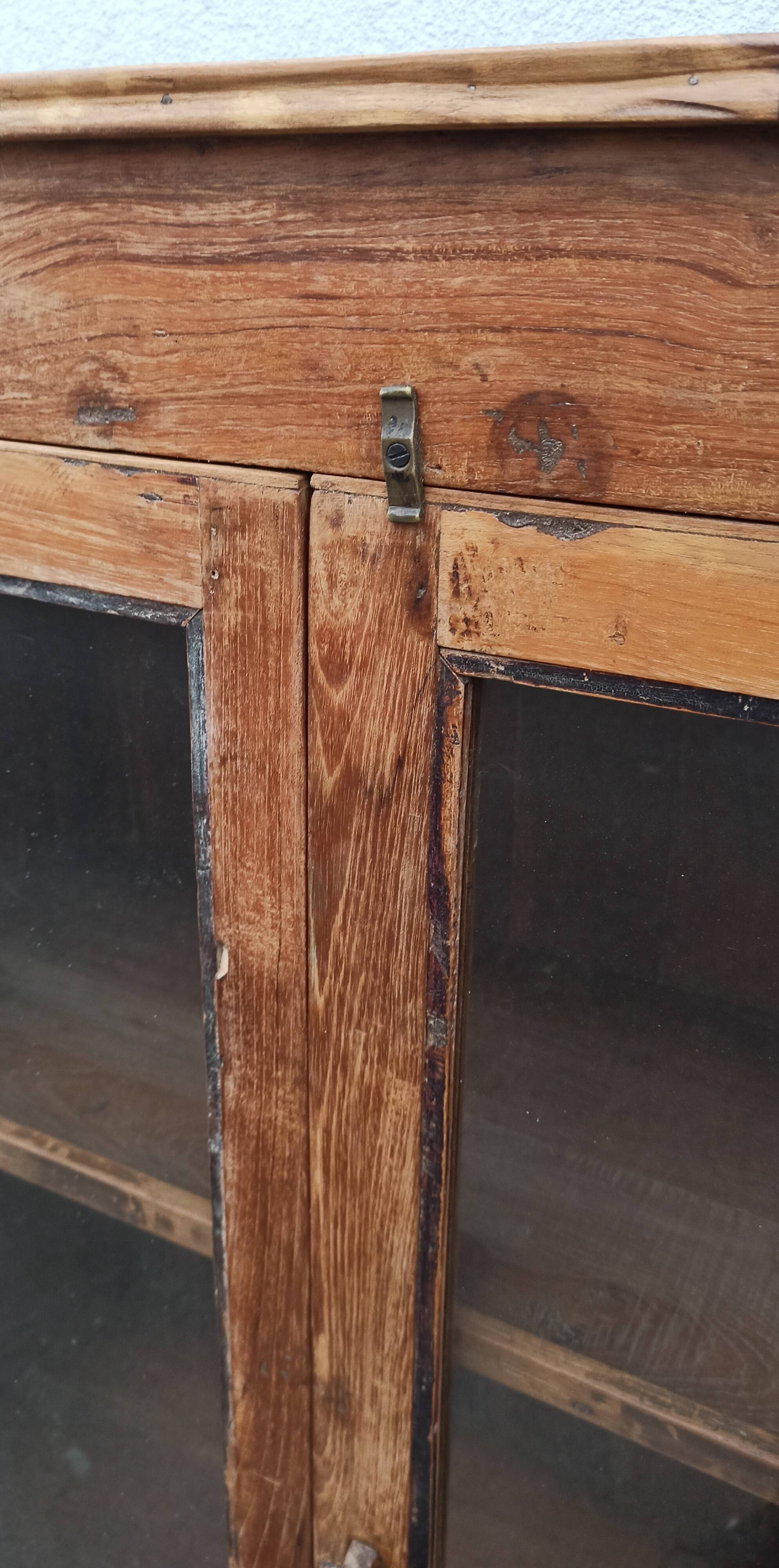 Old glazed teak cabinet