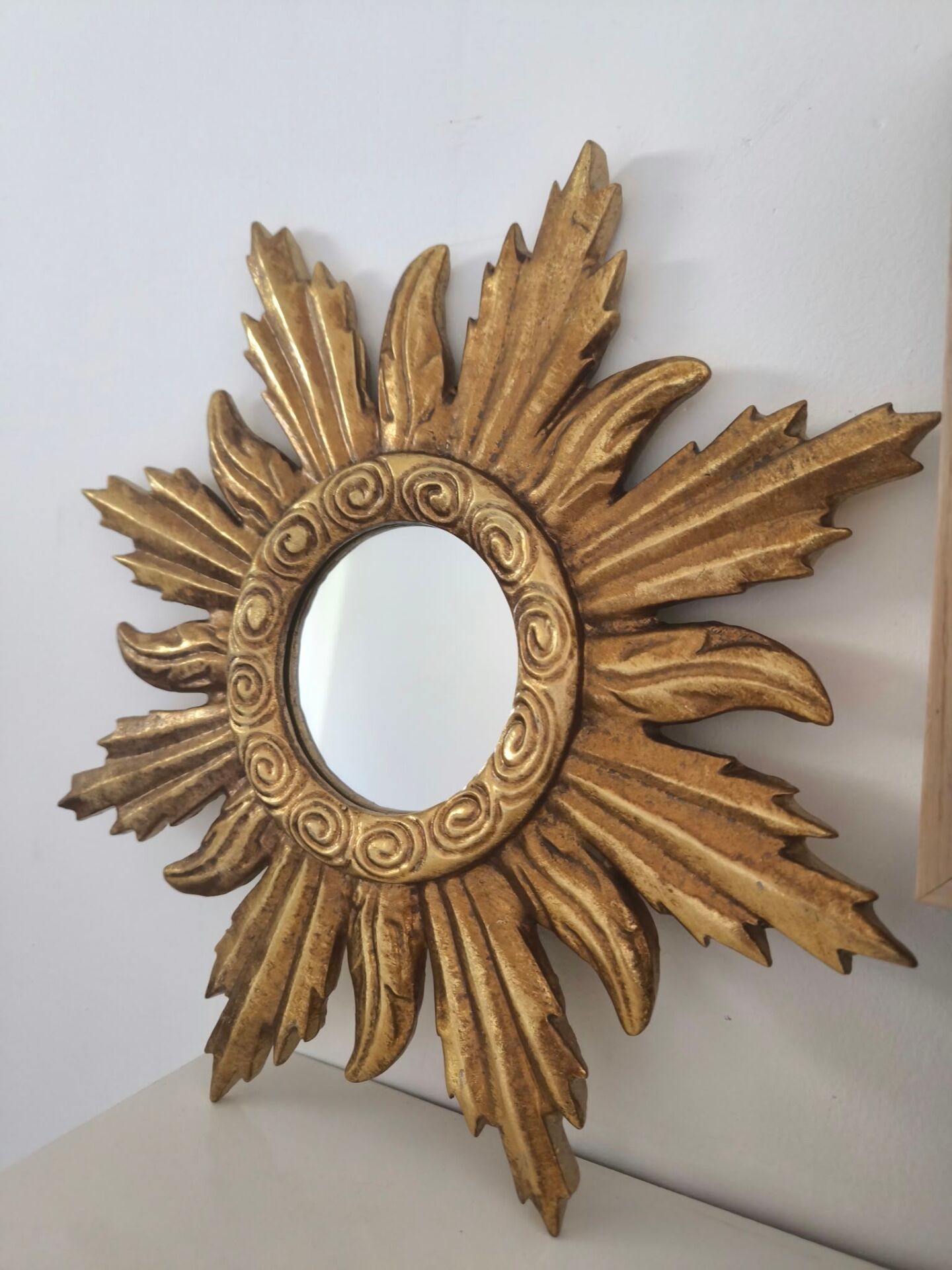 Miroir soleil doré