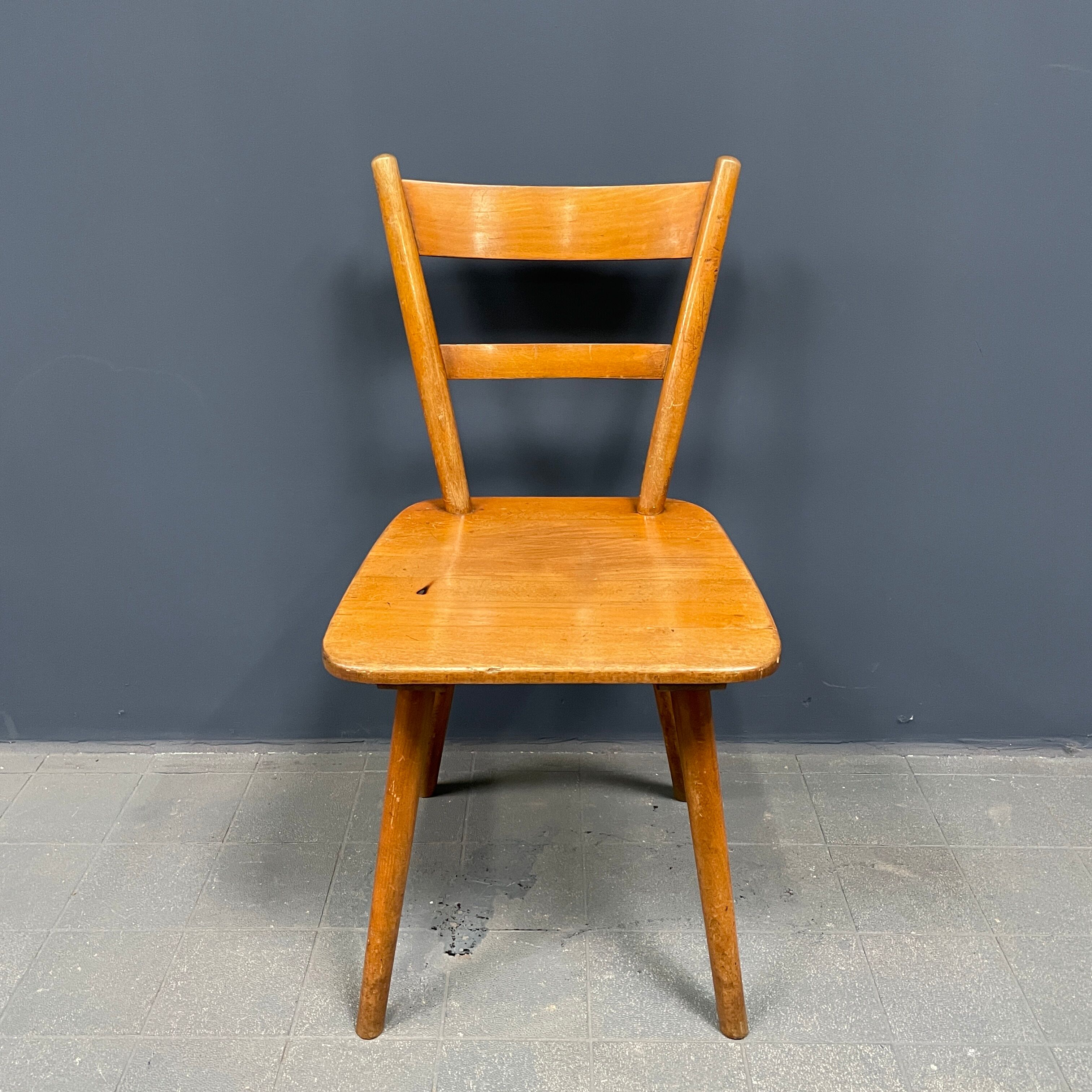 Set of eight german stick chairs from the 1950