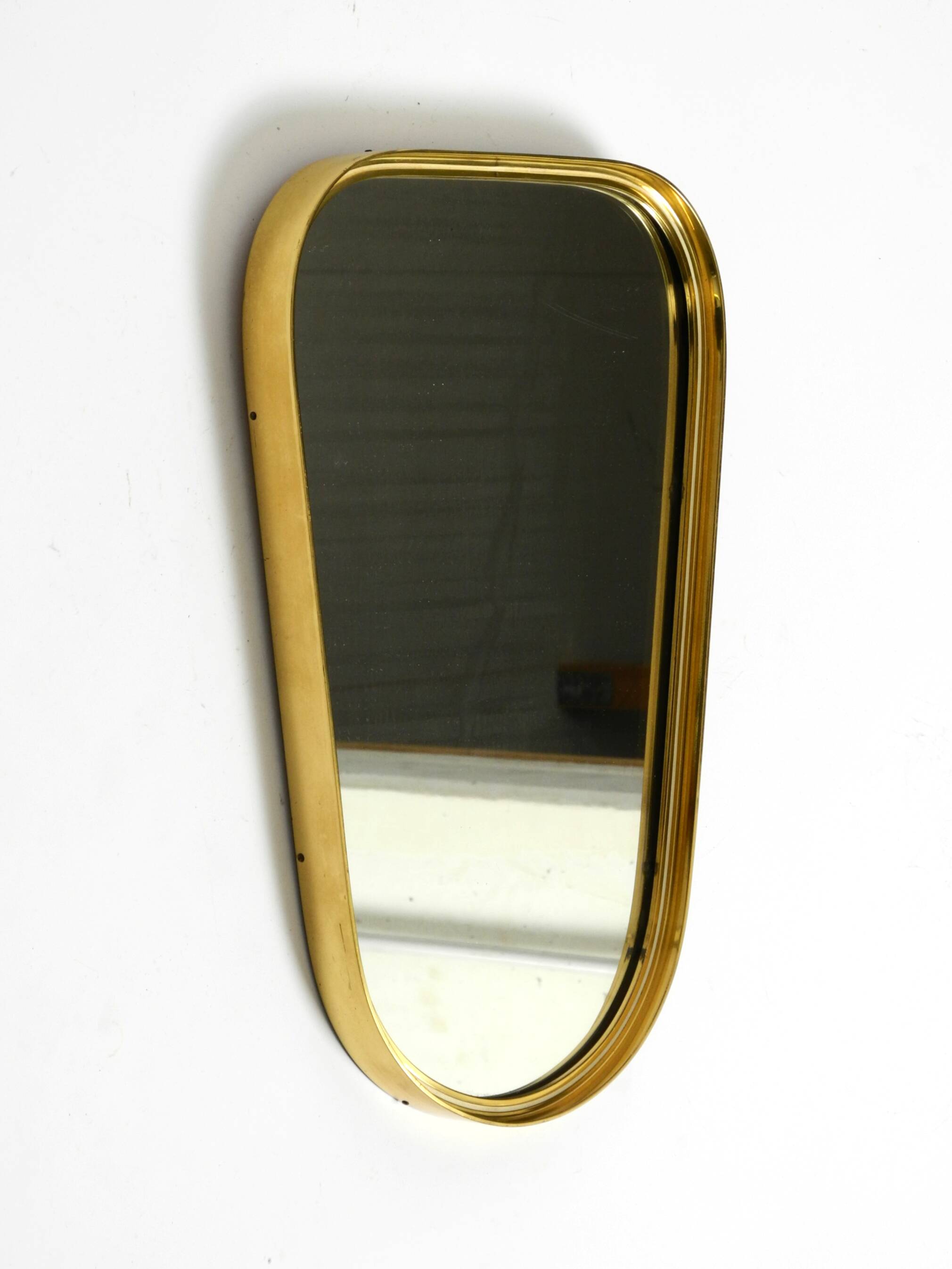 Small solid Mid Century brass wall mirror by Münchener Zierspiegel