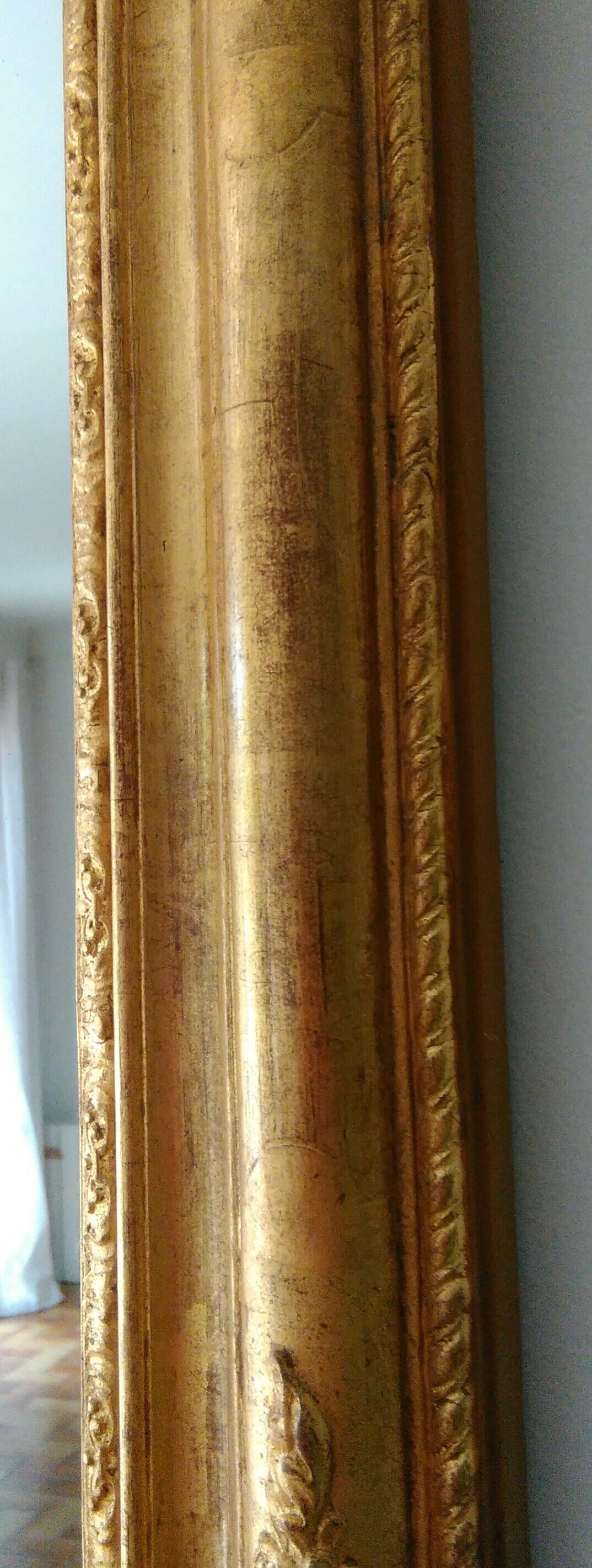 Golden romantic mirror with gold leaf
