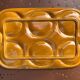 Vintage ochre earthenware artichoke dish, 6 compartments, relief flowers.