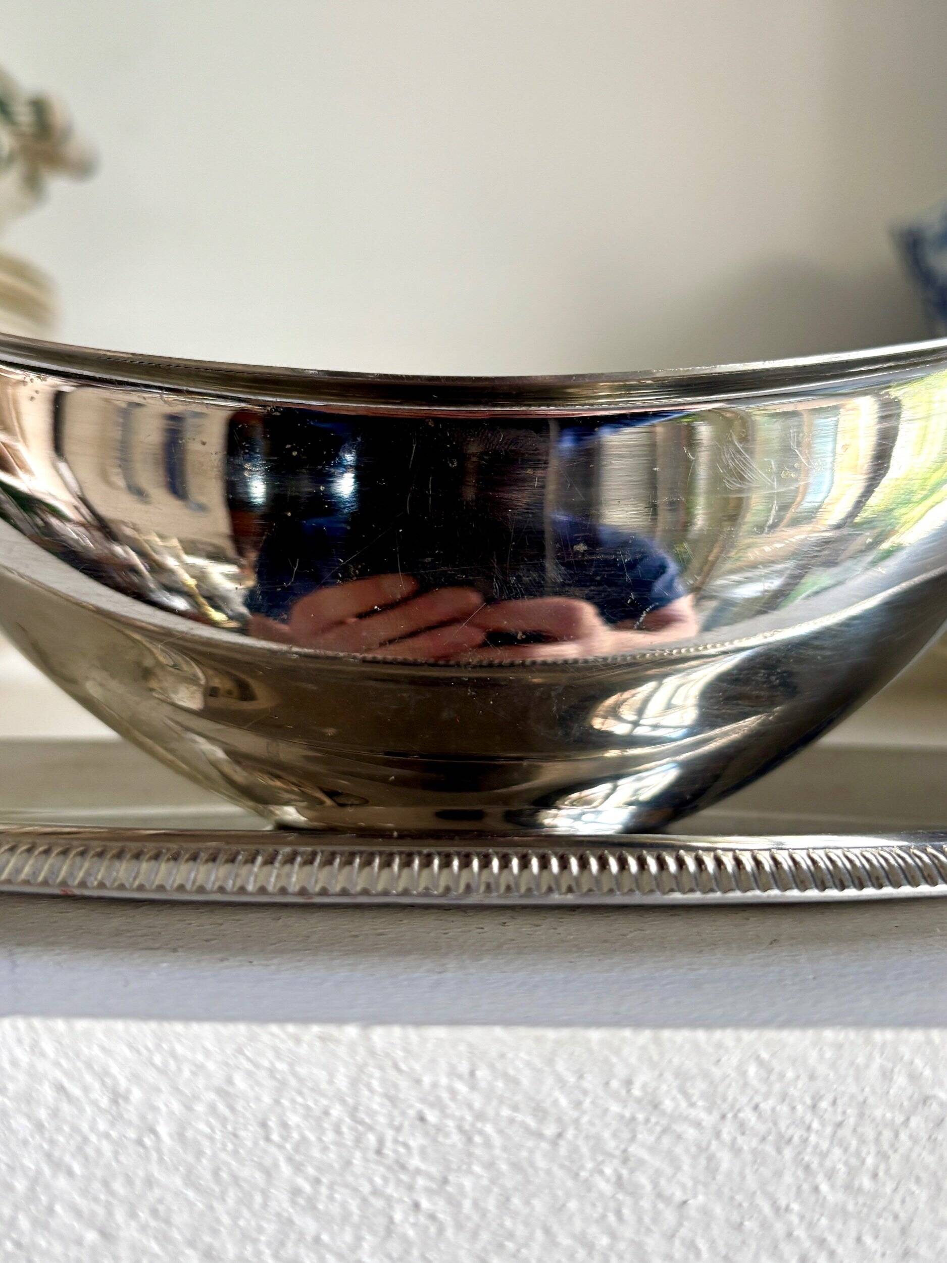 Silver stainless steel gravy boat