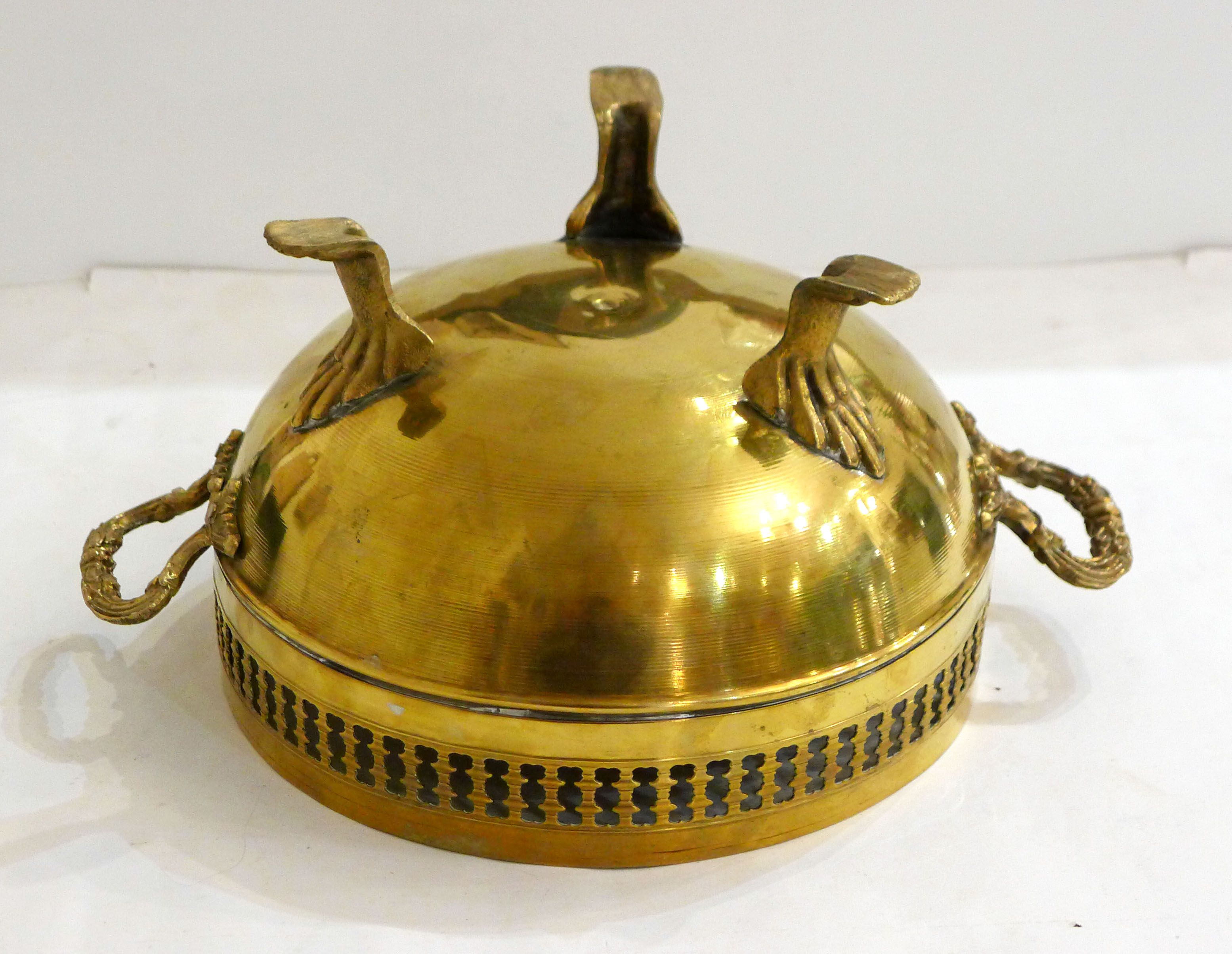 Planter on lion legs, made of golden metal