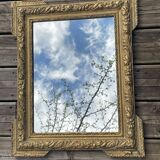 Miroir en bois et stuc doré