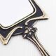 Art Deco hand mirror in bronze 8x17cm