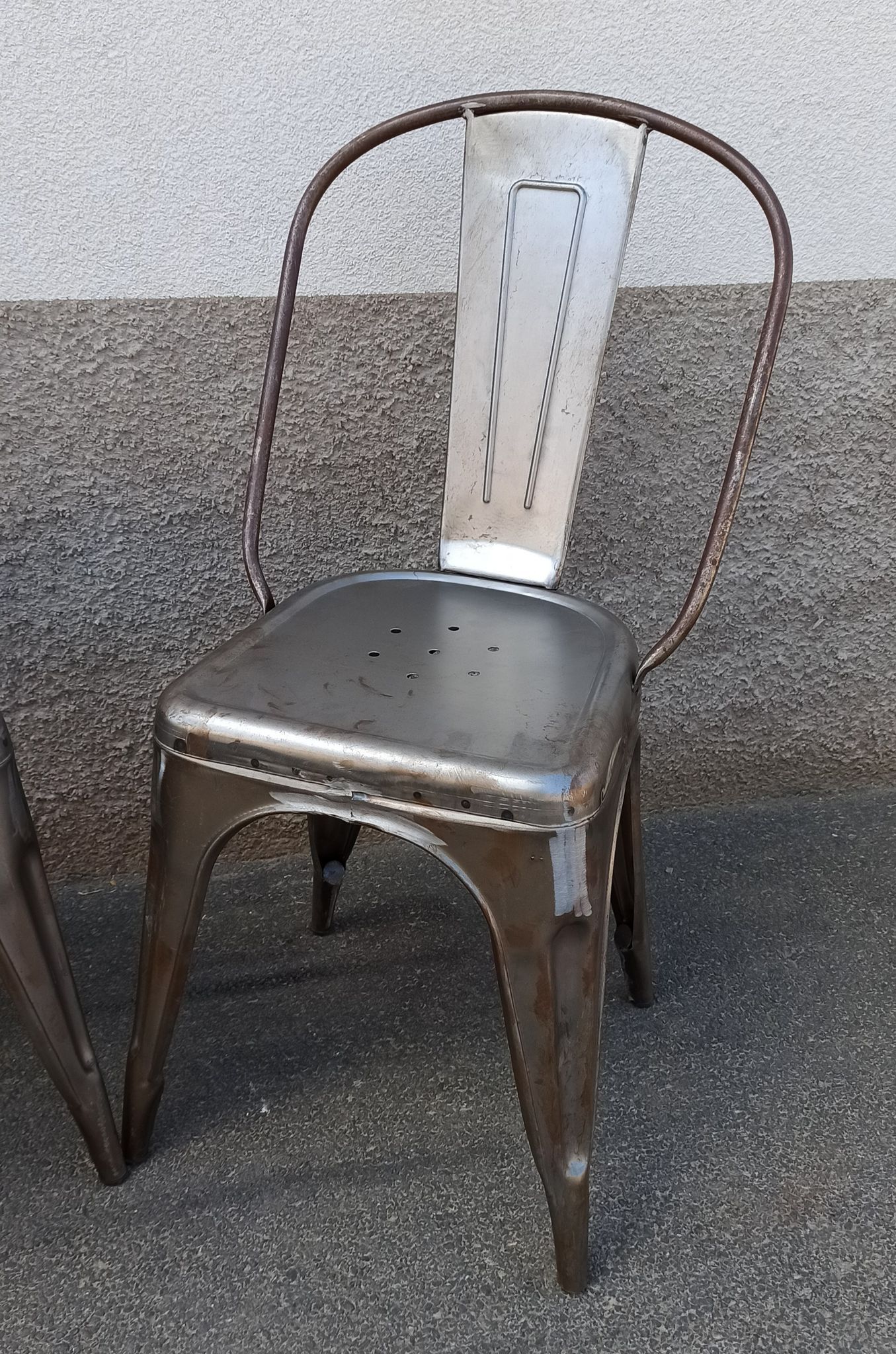 Pair of grey metal chairs