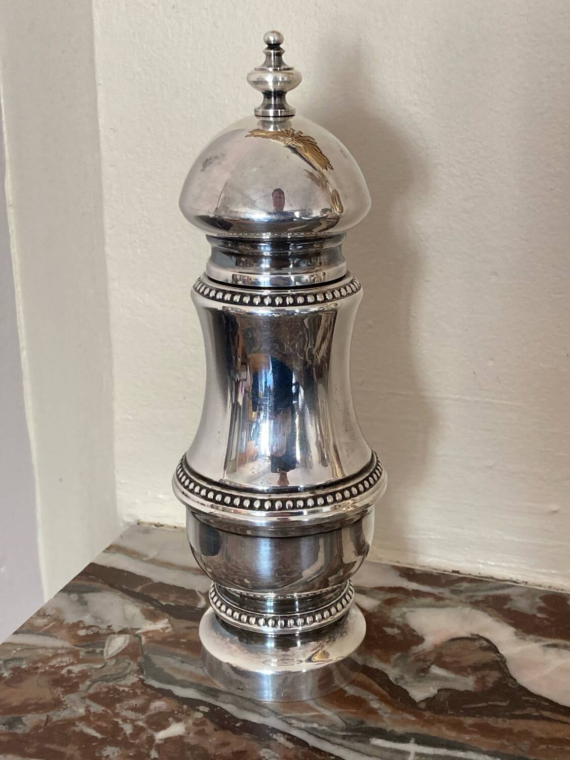 Silver metal pepper mill