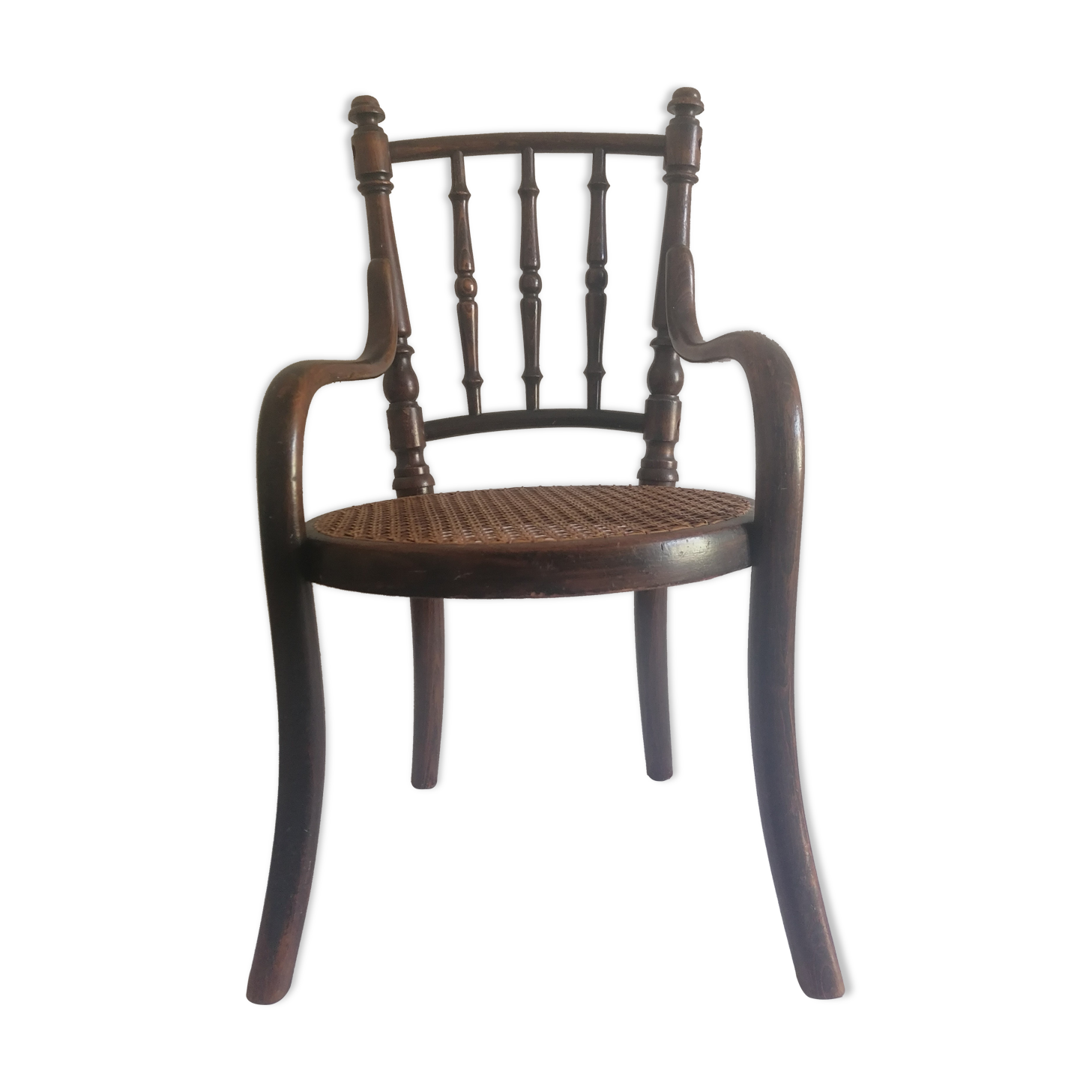 Old children's armchair in curved wood. Fischel