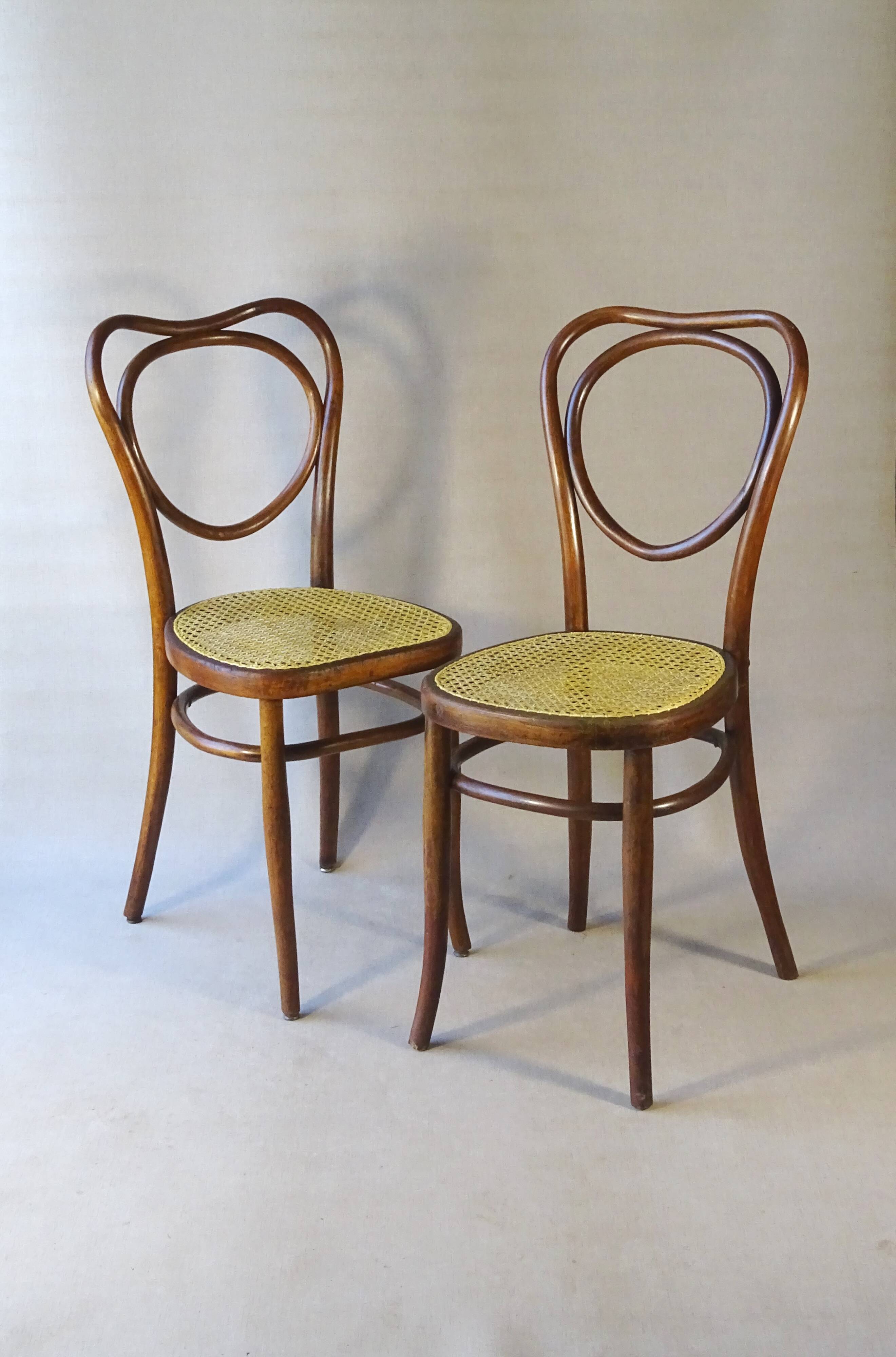 Fake pair of caned bistro chairs, Kohn and Mundus, circa 1910 - no Thonet.