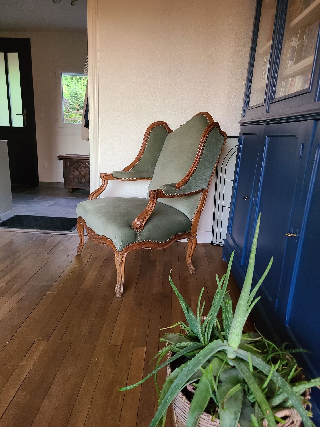 Vintage Louis XV style wing chair, light green velvet