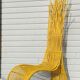 Fauteuil jaune"vague" en rotin