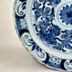 Delftware dish with blue flowers on a white background, 18th century, 35 cm