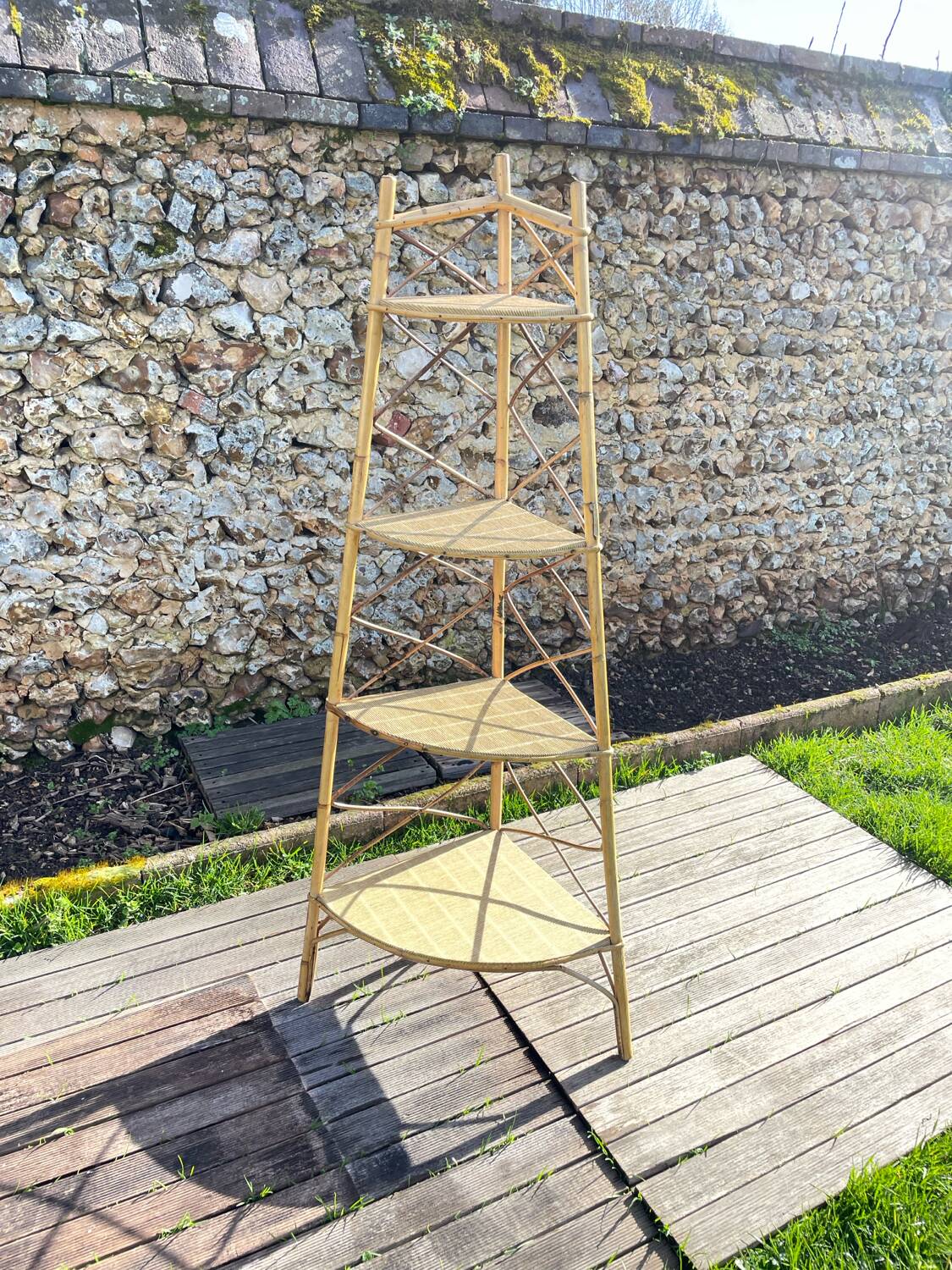 Audoux Minnet style corner shelf in vintage rattan 1950