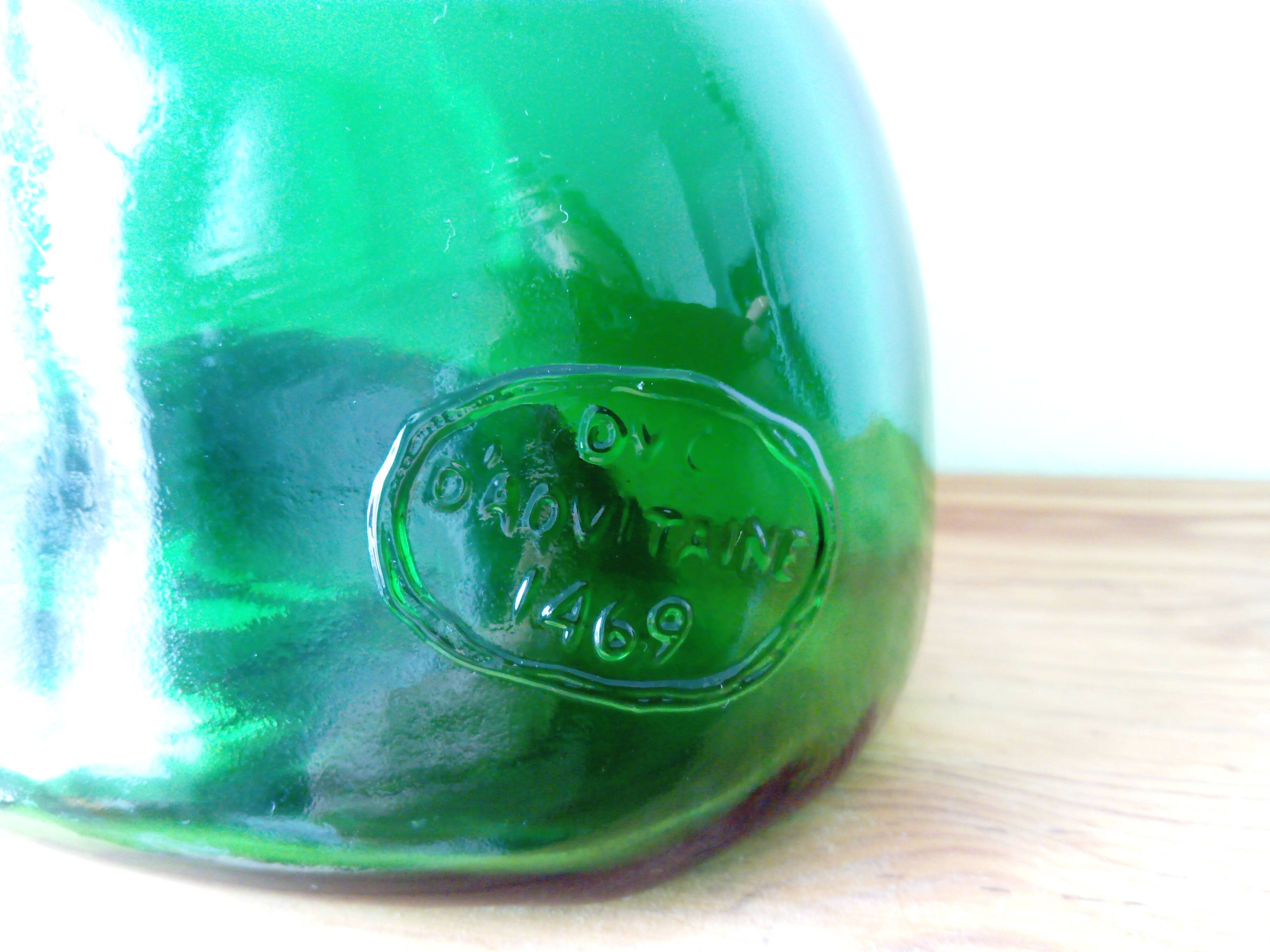 Old blown glass bottle, free form. Armagnac