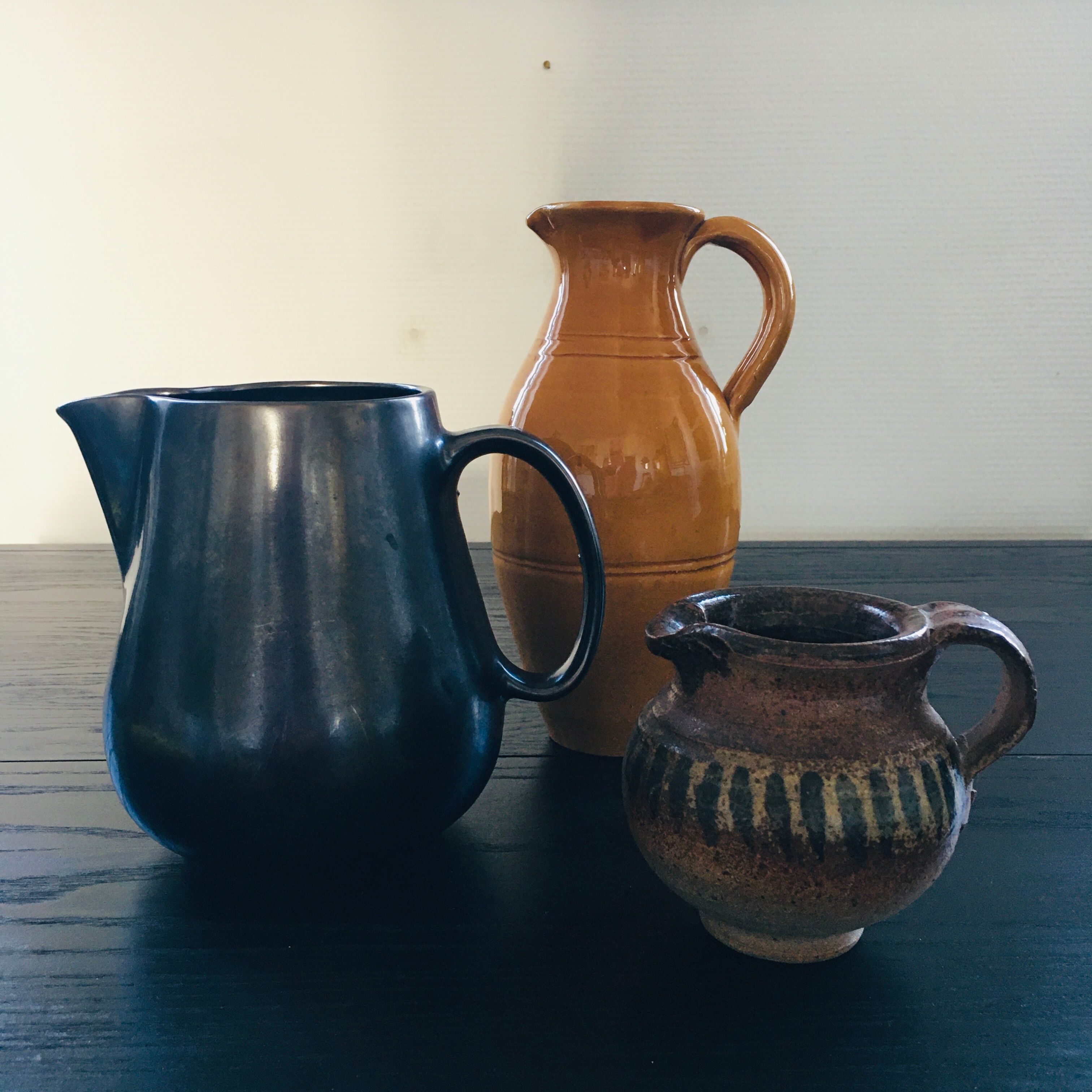 Stoneware pitcher with striped decoration