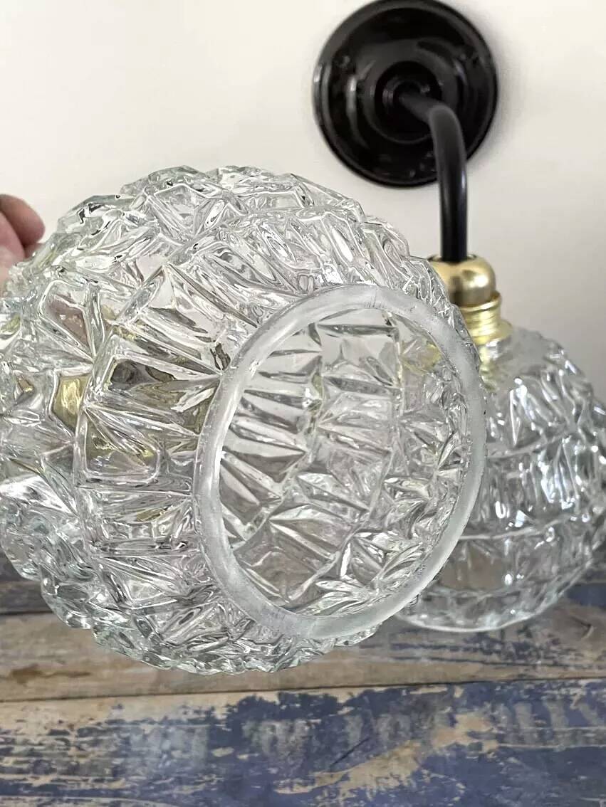 Pair of chiseled glass wall sconces