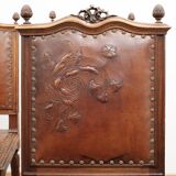 Set of 4 Louis XVI style chairs in carved wood and embossed leather.