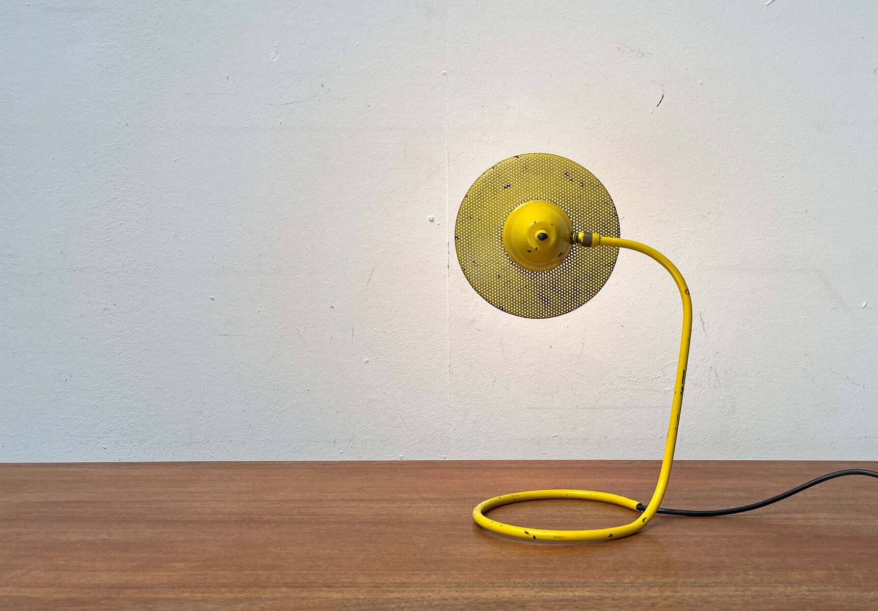 Perforated metal table lamp in Mid-Century Modern style, in the style of Mathieu Matégot, 1960s.