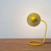 Perforated metal table lamp in Mid-Century Modern style, in the style of Mathieu Matégot, 1960s.