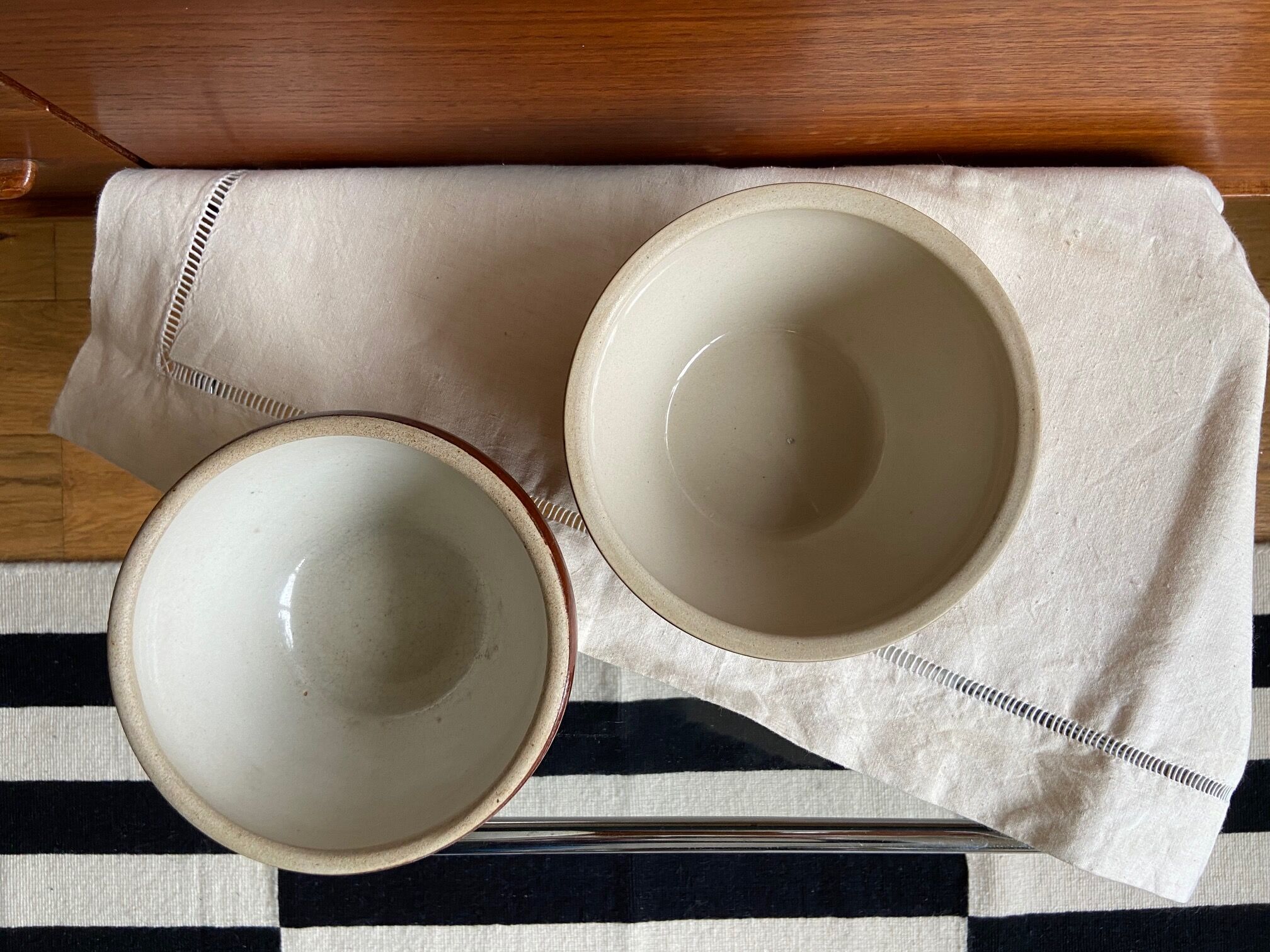 Pair of enamelled sandstone bowls