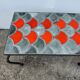 Ceramic coffee table with scales from the 1950s.
