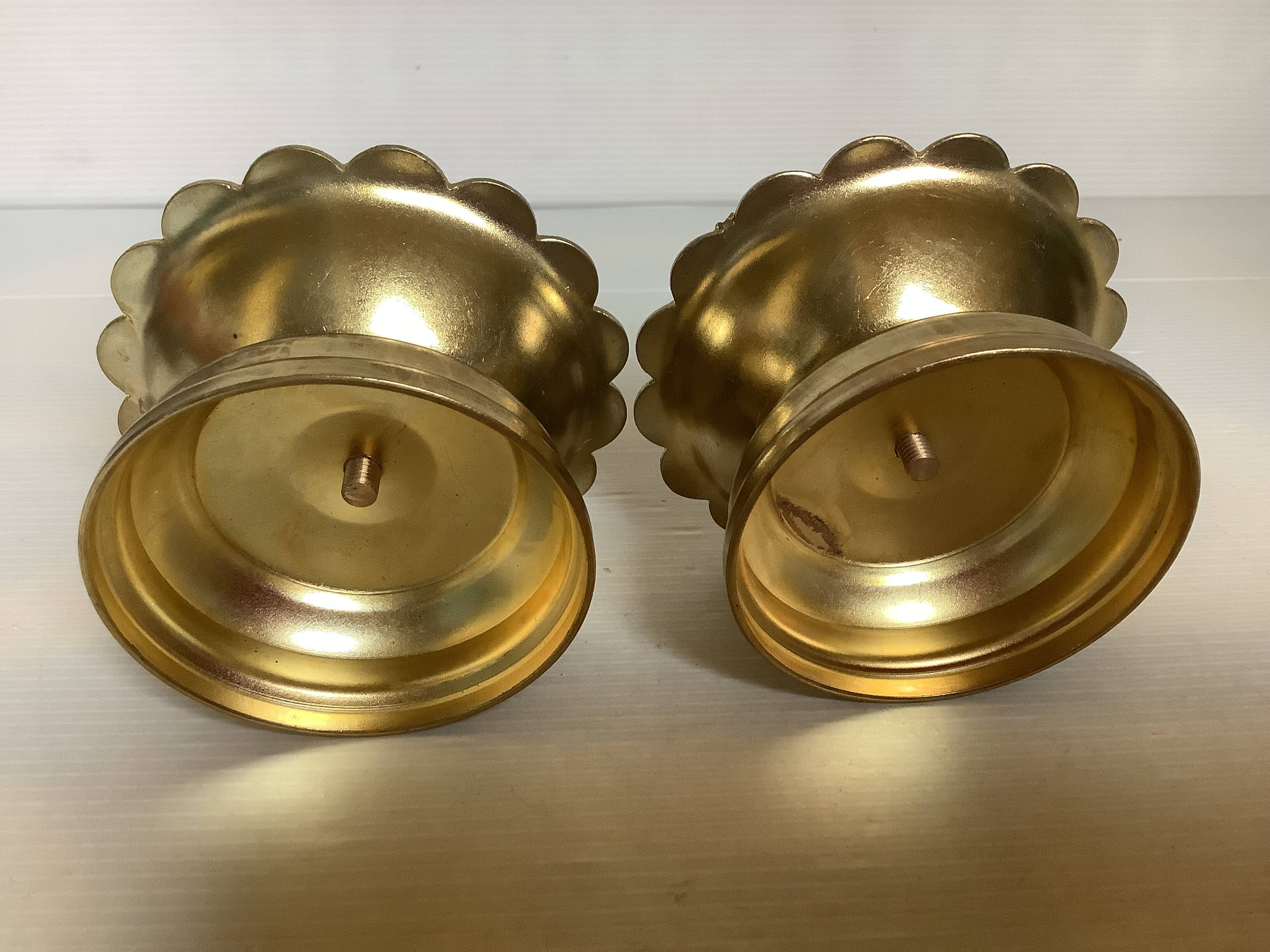 Pair of flower candle holders in gold metal