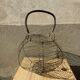 Vintage iron egg basket with hanse antique