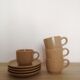 Stoneware cups and saucers