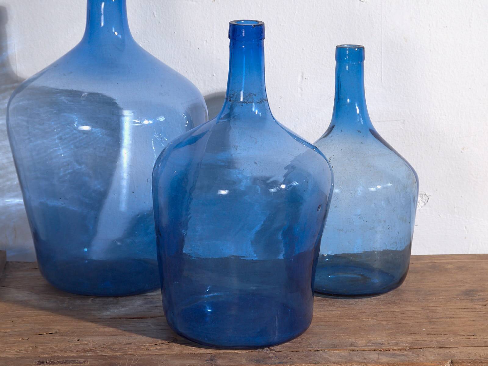 Antique blue demijohns (circa 1920). 3-piece set #1