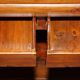 Antique Chinese armoire hand-carved around 1880 with country-style handles.