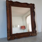 Carved wooden mirror