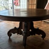 Old oak table with extendable oval central foot