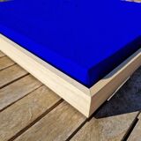 Framed monochrome blue abstract painting.