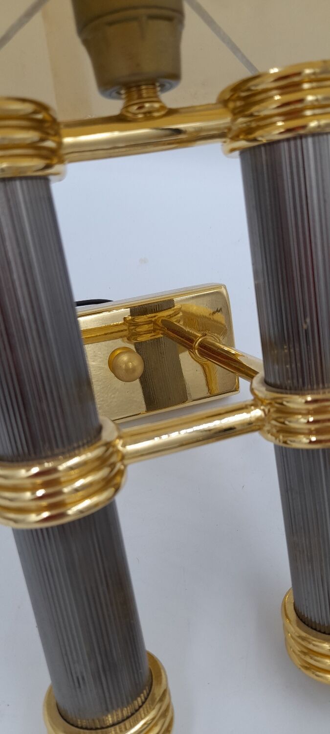 Pair of designer golden brass wall lights with gun barrel decor