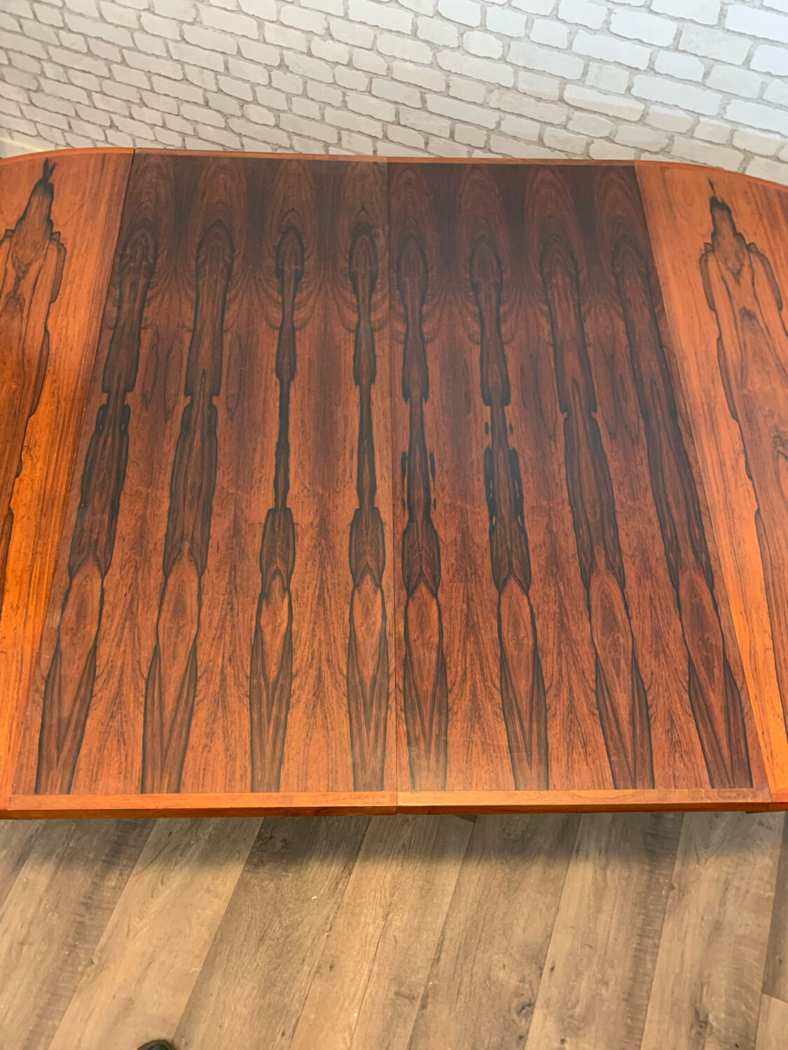 Extendable round table in rosewood 1960