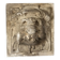 Old plaster tile with a fierce mask decoration, Italy, 19th century.