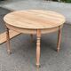 Table à manger ronde extensible Louis Philippe décapée en merisier massif 1