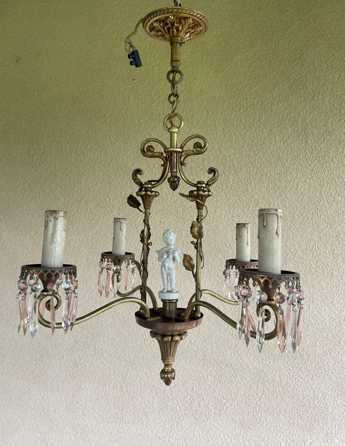 Antique bronze chandelier with porcelain angel.