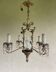 Antique bronze chandelier with porcelain angel.