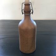 Beige stoneware bottle