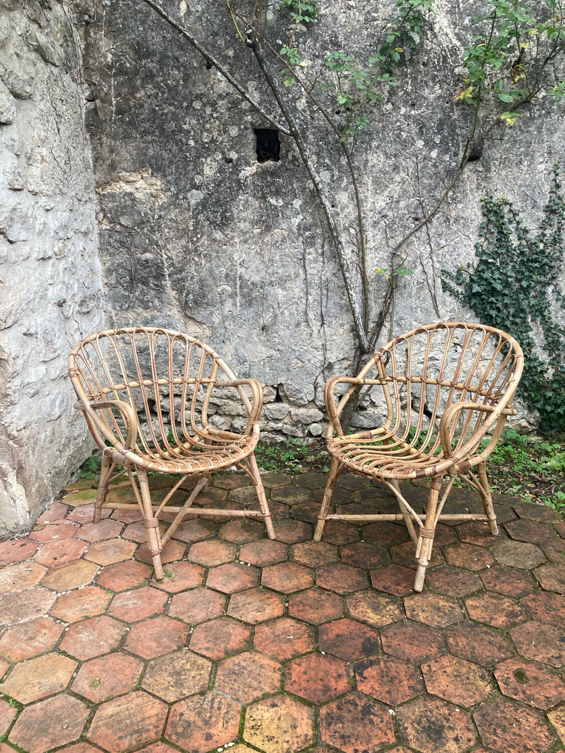 Pair of vintage rattan armchairs