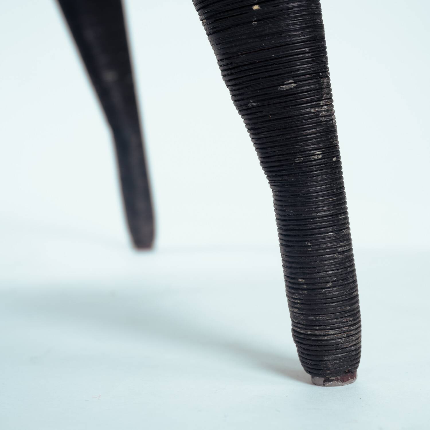 Sculptural rattan tripod armchairs in the manner of Boris Sipek